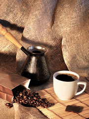 Still life with coffee beans, a Turk and a Cup of coffee