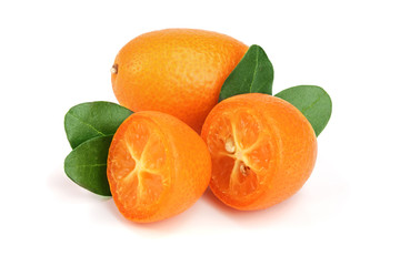 Cumquat or kumquat with leaf isolated on white background close up