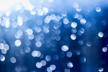 Defocused of light blue and deep blue LED light on black background. Bokeh photo of LED light....