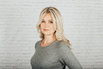 Young blond woman studio portrait