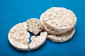Crispy dietary snack on a blue background.
