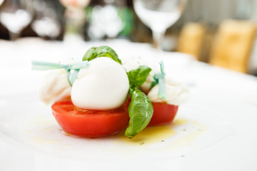 Mozarella cheese with tomatoes