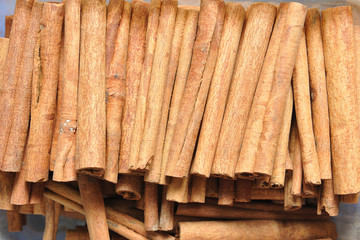 Beautiful and fresh seasoning cinnamon, close-up from the seller in the market
