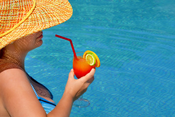 Real female beauty relaxing in swimming pool