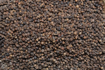 Beautiful and fresh seasoning black pepper, close-up from the seller in the market