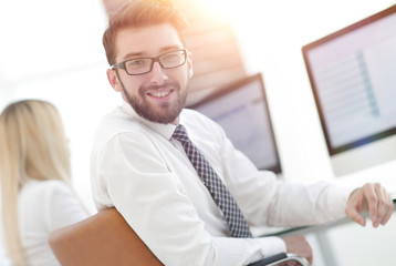 experienced programmer sitting in front of the monitor.