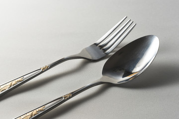  Fork and spoon on a white background