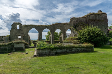 Fototapeta na wymiar Ruin of a medieval monastery in summertime