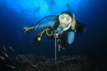 Young woman scuba diving