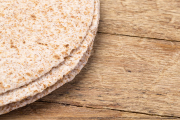  tortilla  on wooden table background