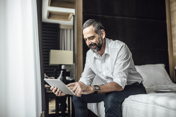 Businessman Holding Tablet