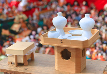 Japan Shinto ritual articles and Japanese dolls displaying on tiered stand during the Grand Bonfire Ceremony of farewell memorial service of old, used dolls at the shrine Close up, Magnified image 3