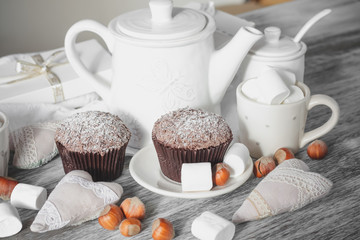 Teapot, cupcakes and different decorations
