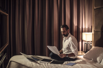 Fototapeta premium Businessman Working Late