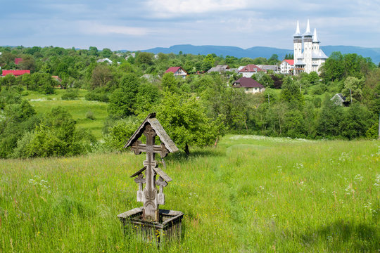 A Cross in a field before Breb Church in Maramures, Romania
