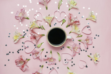 Cup of coffee in a center of flower composition. Spring magic picture. top view, flat lay