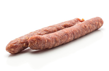 Hungarian dry sausages pepperoni isolated on white background two smoked in natural casing mixed pork and beef.