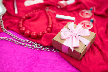 Gifts Packed in Kraft boxes tied with satin ribbon.