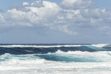 Fototapeta premium Rough turquoise sea with big waves and surf at La Santa, Lanzarote, Canary Islands, Spain