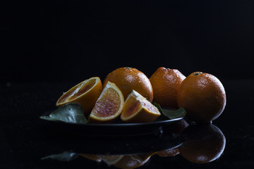 orange on black table