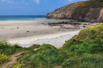 Wild sandy beach near promontory Pointe du Raz in Brittany, France