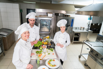 Chef Cooking, Cutting and preparing next plate