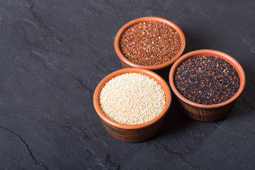 Black , white and red quinoa in bowl