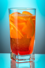 Summer refreshing faintly alcoholic cocktail Aperol spritz in a 