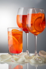 Summer refreshing faintly alcoholic cocktail Aperol spritz in a 