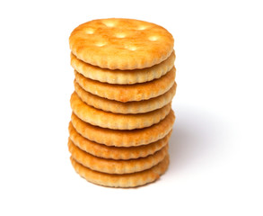 Biscuit cracker stack of yellow round isolated on white background
