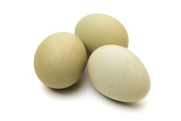 Green eggs from Araucana chicken isolated on white