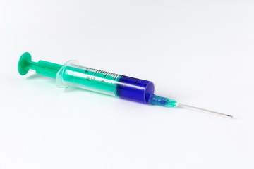 Disposable syringe  with blue liquid