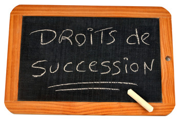 Obraz premium Droits de succession écrit sur une ardoise 