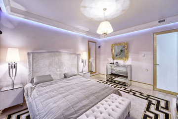  Russia, Moscow region - bedroom interior in a new luxury house.