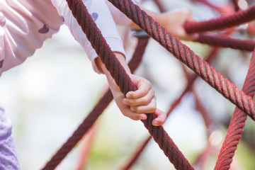 rope in the playground, rope bridge in an adventure rope at the playground park Bangkok Thailand.