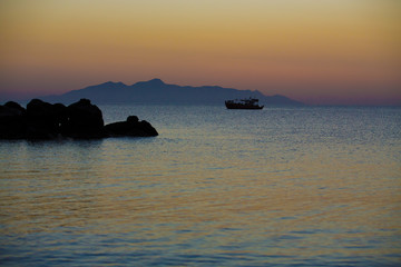 Fototapeta na wymiar Fishing boat in the sea at night