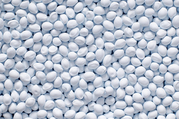 Polymer additive in granules, background texture