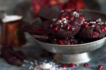 Metal bowl with chocolate bars with pomegranate and sea salt