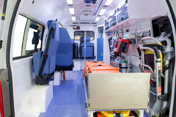 Inside an ambulance with medical equipment for helping patients before delivery to the hospital.