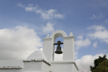 Bell in whitewashed church tower in Lanzarote canary