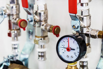 fixture pipes and fittings for connection of water or gas systems. focus on pressure gauge