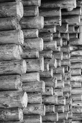 Constuction of wood logs. Wood logs texture background closeup