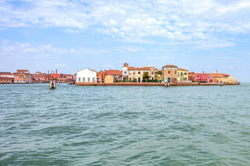 Fototapeta premium Daylight view from boat to historic architecture buildings in sunny day