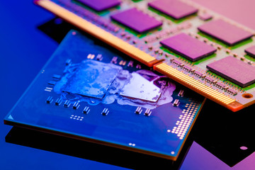 technology cyber electronic concept. cpu ram computer on blue light background