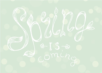Fototapeta na wymiar Hello Spring. Beautiful spring background with bokeh and handwritten text.