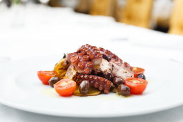 Grilled octopus with vegetables