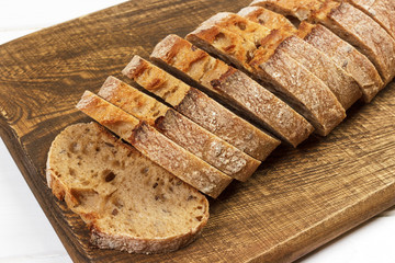 fragrant crispy slices of rye bread on white background