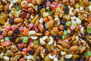 Background of nuts and candied fruits.