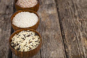 Three bowls with different varieties of rice