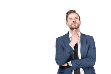 portrait of thoughtful caucasian businessman in suit isolated on white